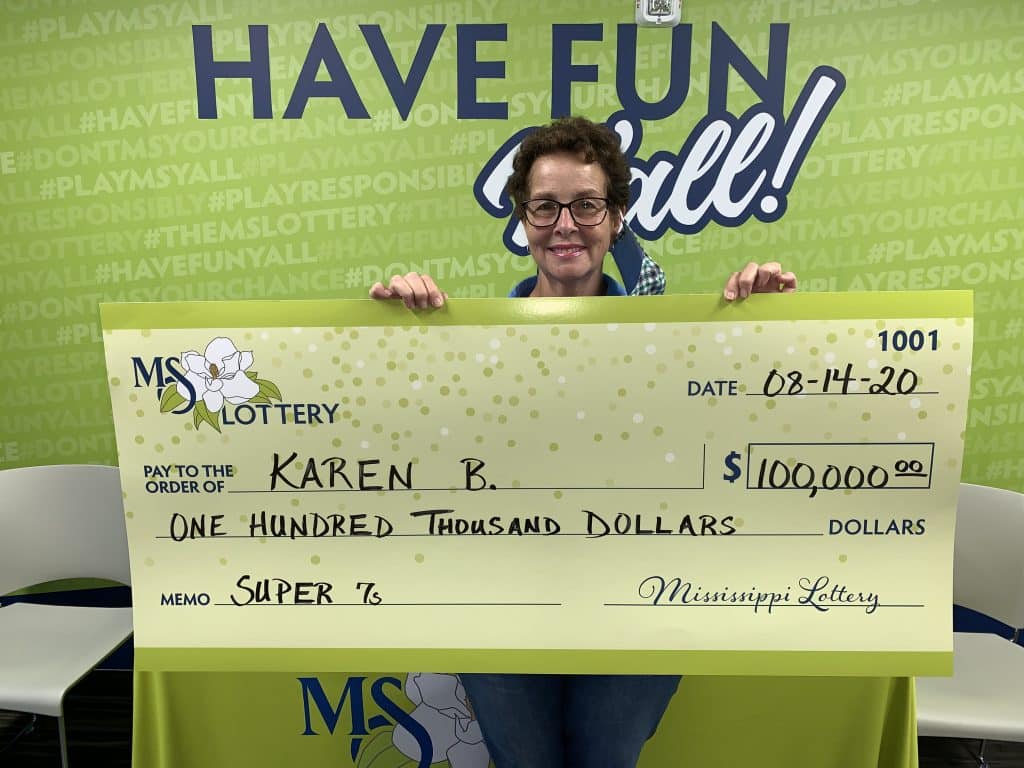 Karen B. of St. Amant, LA., won $100,000 on a Super 7s scratch-off game purchased from Farmers Depot 158 on HWY 13 N., Mendenhall.