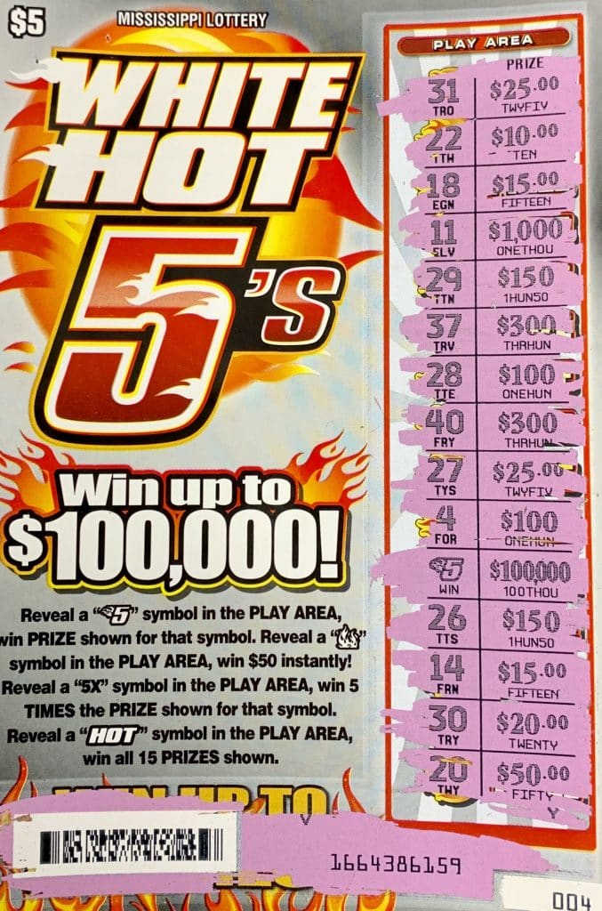 A Clinton woman won $100,000 on a White Hot 5s scratch-off game purchased at Exxon on Clinton Blvd., Clinton.