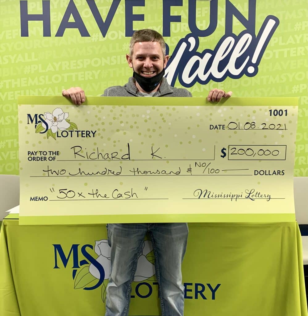 Richard K. of Columbus won $200,000 on a 50x the Cash scratch-off game purchased from Laminsa Oil Corporation of Columbus on Main St., Columbus.