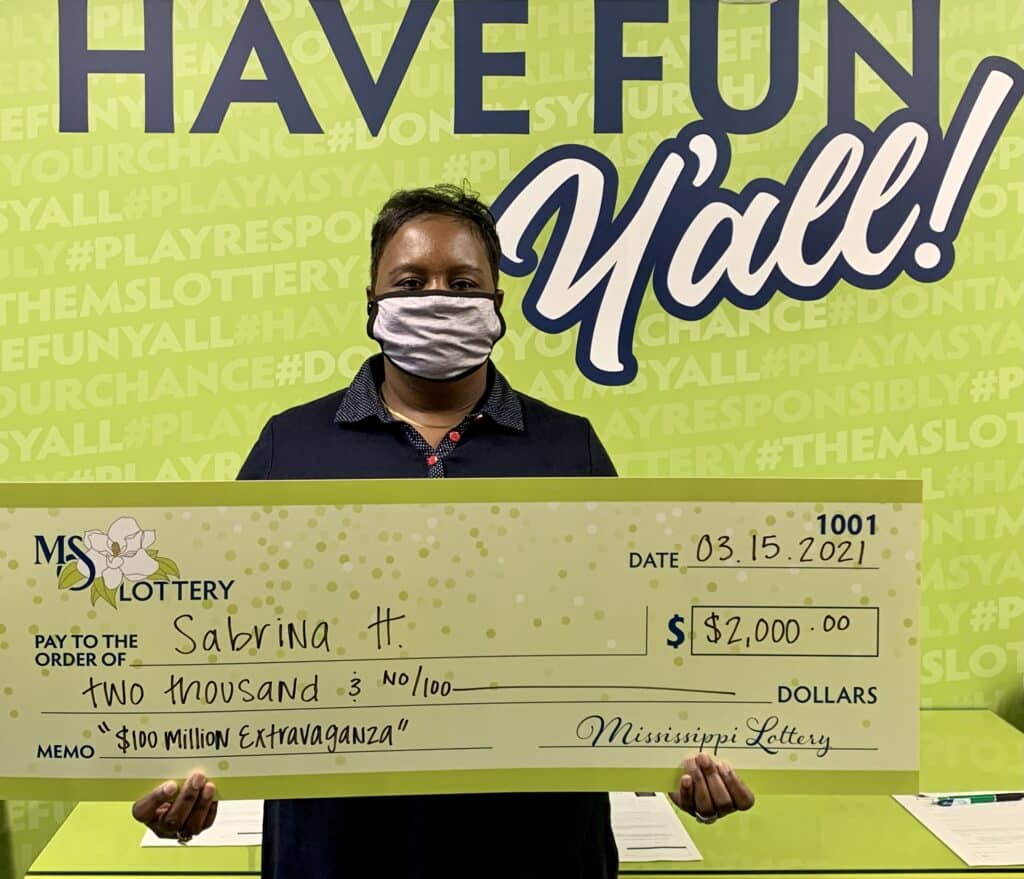 Sabrina H. of Holly Springs won $2,000 on a $100 Million Extravaganza scratch-off game purchased from On The Square Market on N. Memphis St., Holly Springs.