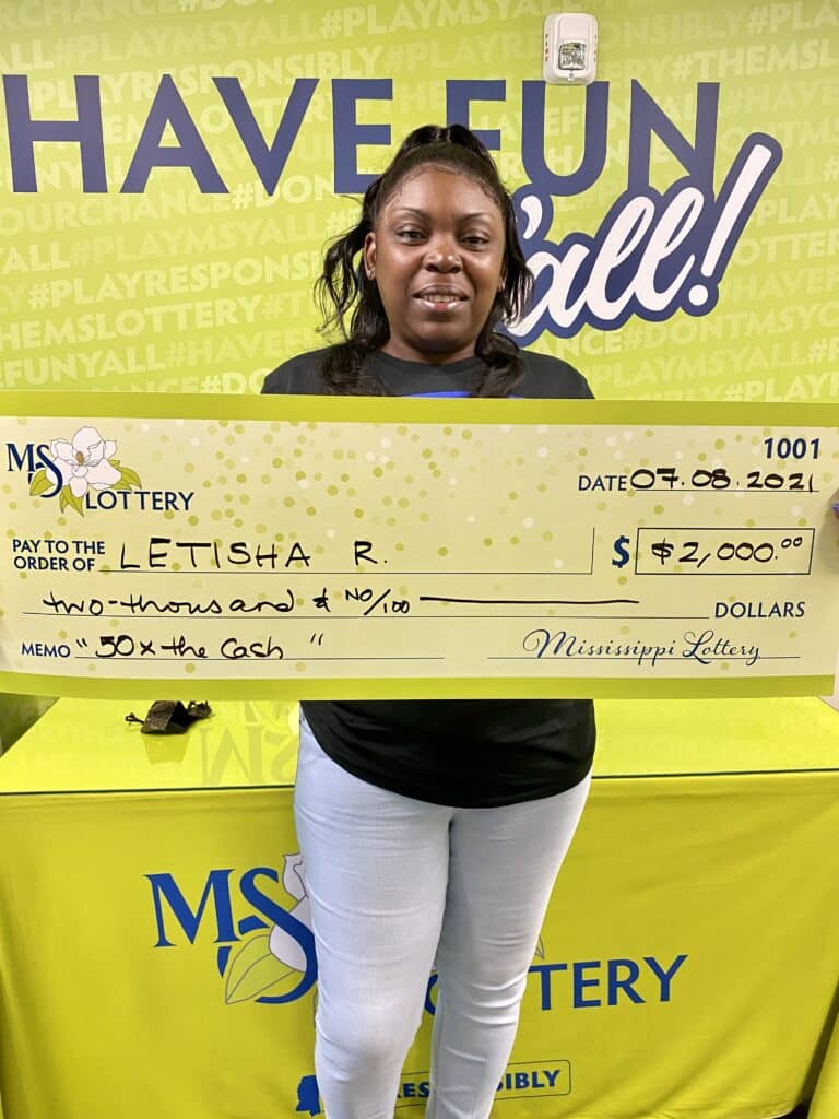 Letisha R. of Columbus won $2,000 on a 50x the Cash scratch-off game purchased from Sprint Mart #4101 on Alabama St., Columbus.