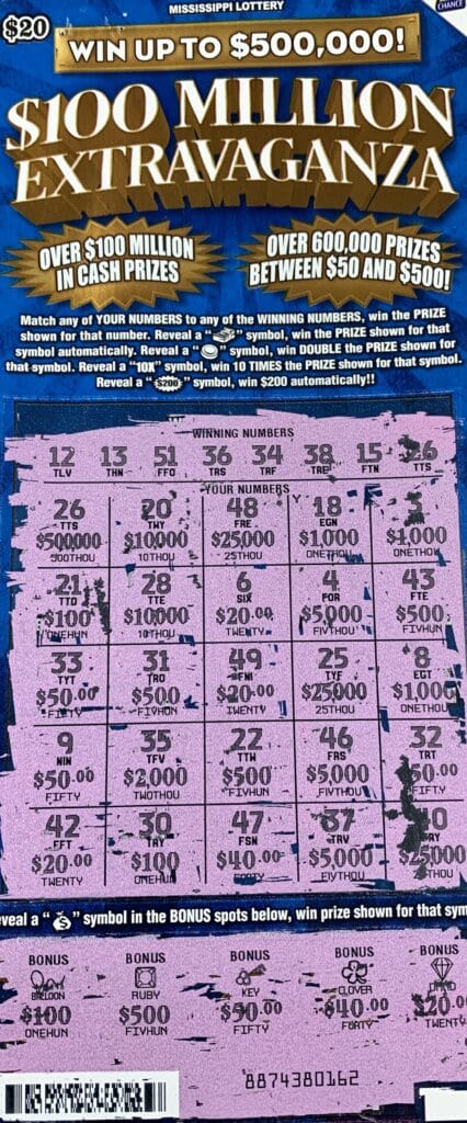 A Kemper County woman won $500,000 on a $100 Million Extravaganza scratch-off game purchased from Scooba Junction on US-45, Scooba.